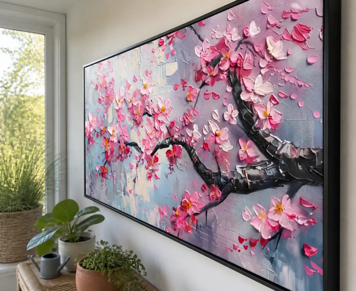 Hand-painted floral canvas wall decor in a modern neutral living room