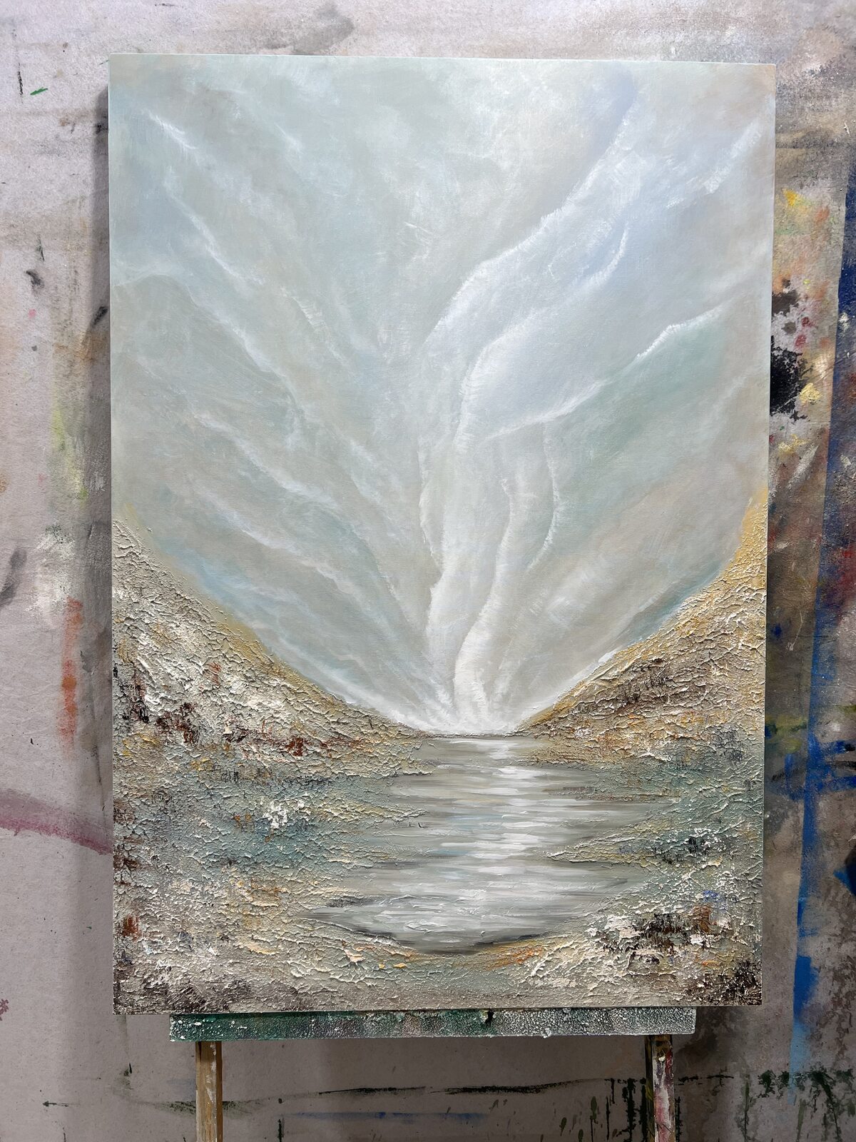 Close-up of a hand-painted white and silver 3D textured abstract painting showing real impasto brushwork