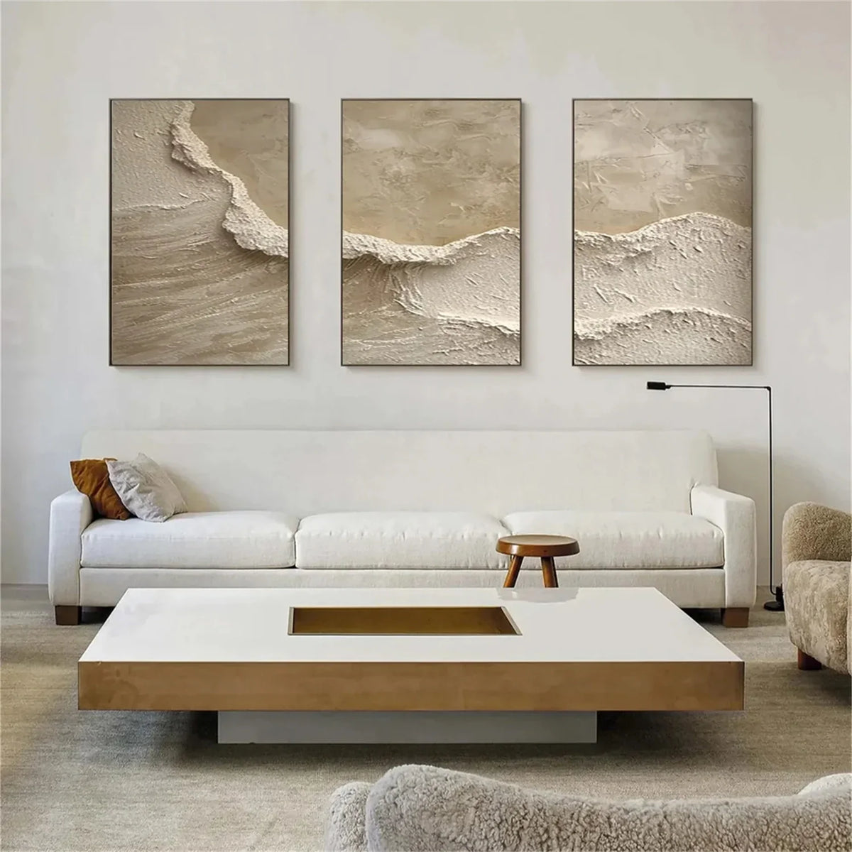 Set of 3 matching abstract textured paintings with continuous gold leaf flowing across canvases.