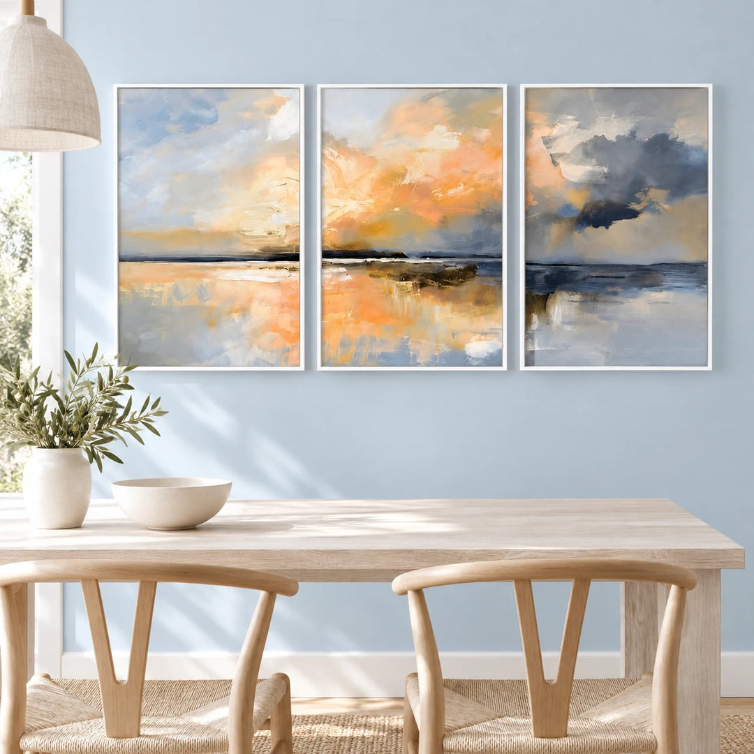 TP1419 coastal landscape triptych with white frames in a bright Scandinavian dining nook