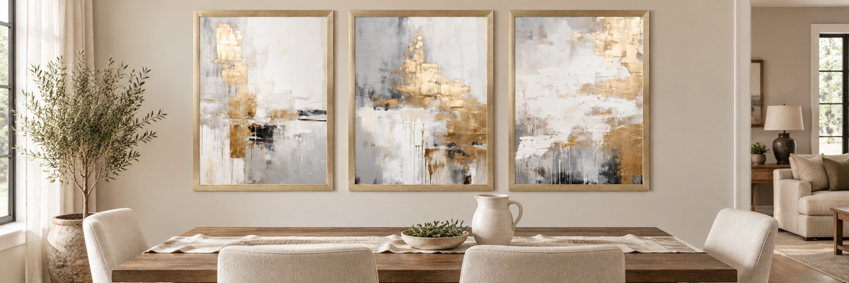 Coordinated beige and gold triptych in a home dining room